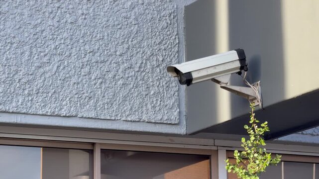 A security camera outside an office block.