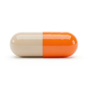 One single orange and beige medical pill capsule isolated on white background