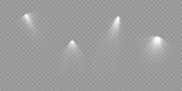 The spotlight shines on the stage. light exclusive use lens flash light effect. light from a lamp or spotlight. lighted scene.