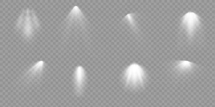 A spotlight shines on the stage. Light from an exclusive lens, a flash of light effect. Light from a lamp or spotlight. Illuminated stage. A podium under a spotlight.