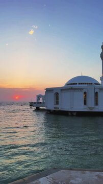 Al Rahma Floating Mosque in Jeddah at sunset over Red Sea, Saudi Arabia