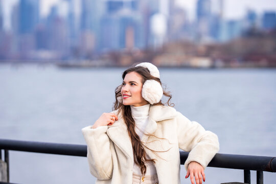 Luxury winter style in New York City streets. Fashion street shoot in NewYork City. Winter woman in festive New York atmosphere. Winter fashion lifestyle in New York. Woman in winter New York City.