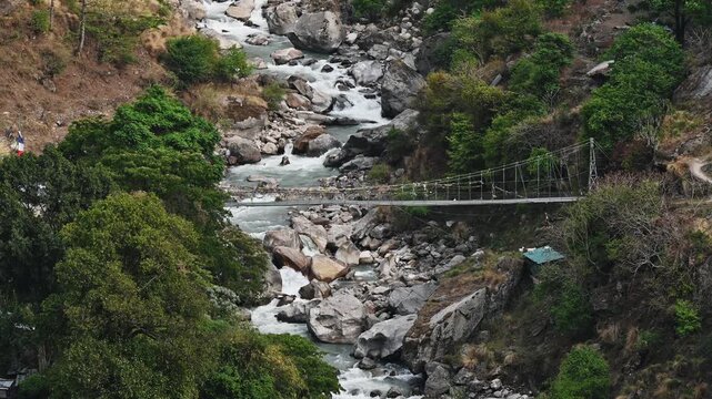 Scenery view of Langtang Khola river flowing down and merges with the Trishuli River near the town of Syabrubesi (Syaphru) in the Rasuwa district of Nepal.