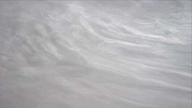 Cinematic Minimal Timelapse Background with Soft Gray Cloud Texture Flowing Across Wispy Sky Patterns, Creating Calm Atmospheric Motion and Monochrome Visual Depth for Abstract Design Backgrounds