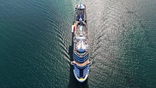 Aerial top view of cruise summer vacation. Cruise ship tour and travel at sea. Aerial luxury liner voyage. Ship top view. Luxury liner resort. Cruise ship voyage. Entertainment deck
