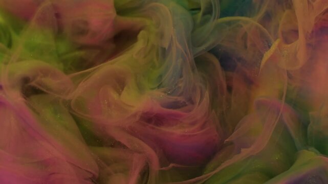 Paint drop. Fume blend. Blur pink purple yellow colorful glitter splash vibrant texture underwater cloud on abstract art background.
