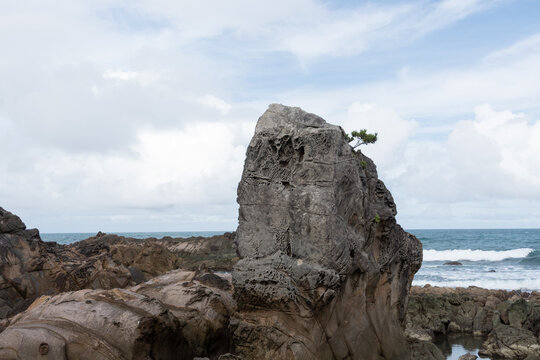 Massive Unique Suzushima Sea Rock Formation Standing on Pacific Ocean Coast in Shingu Wakayama Japan
