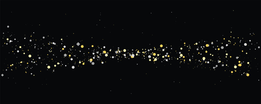 Abstract golden bokeh lights against a black background creating a festive celebration concept with a shallow depth of field
