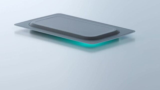 Futuristic solid state battery cell or sleek electronic component with cyan neon underglow