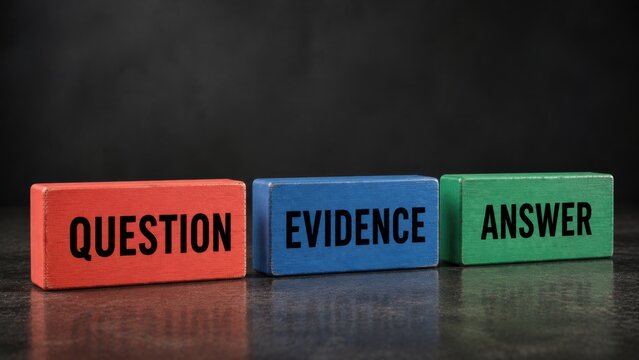 Arranged wooden blocks with question evidence answer words on dark surface for analytical problem.