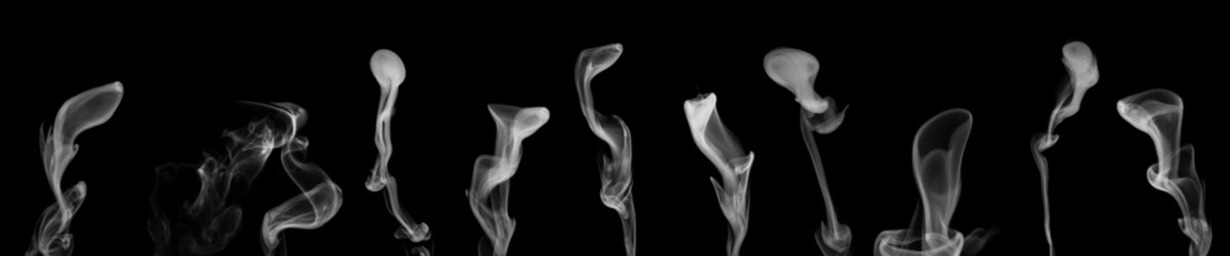 A set of different steam, smoke, gas isolated on a black background. Swirling, writhing smoke to overlay on your photos. Smoky banner. Halloween design.