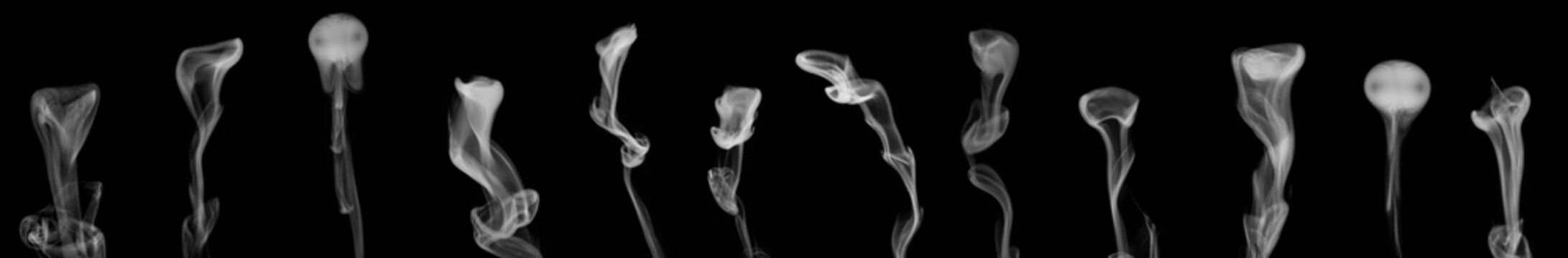 A set of different steam, smoke, gas isolated on a black background. Swirling, writhing smoke to overlay on your photos. Smoky banner. Halloween design.