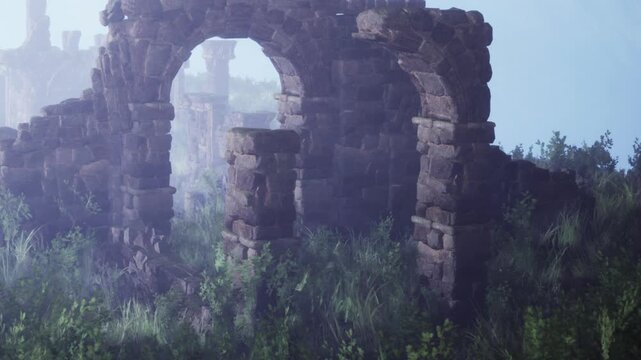 Stone arches stand in a misty landscape, covered in green grass and plants. The time of day is unclear, with fog adding a mysterious feel to the scene.