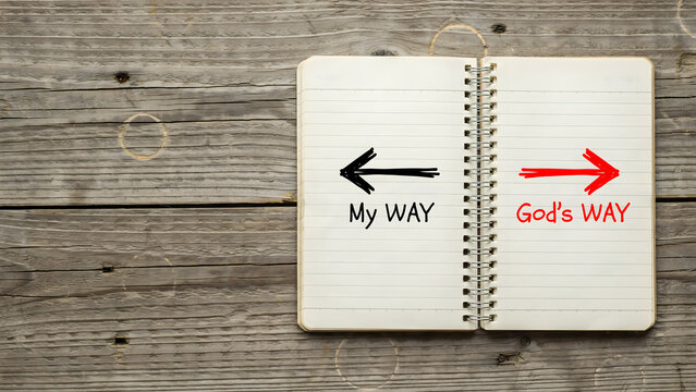 Open notebook with hand drawn arrows comparing my way versus god's way