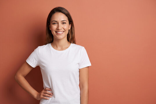 Young woman smiling wearing white tee casual portrait
