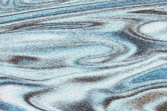 Abstract blue and black wavy texture, closeup fullframe background