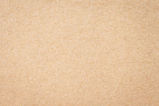 Brown kraft paper texture background with natural fiber details.