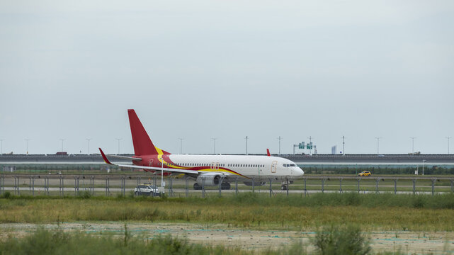 Passenger Airplane Taxiing at Airport