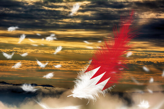 3D illustration. Flag of Bahrain on a feathers fluttering in the sky background.