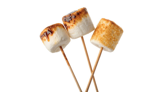 Three delicious toasted marshmallows on thin wooden sticks isolated on a white background