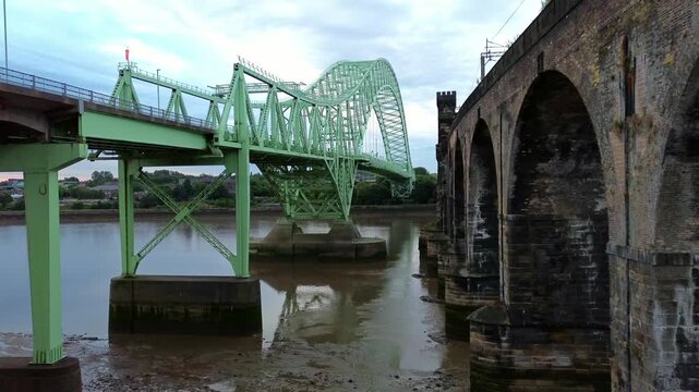 Silver Jubilee bridge aerial view rising towards the green archway structure