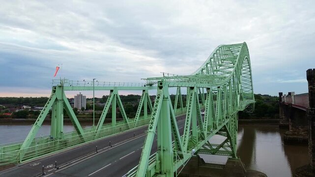Silver Jubilee bridge aerial view dolly right at road level