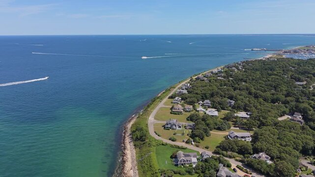 Drone view of luxury oceanfront homes and coastal road along Vineyard Sound in Oak Bluffs, Massachusetts, USA