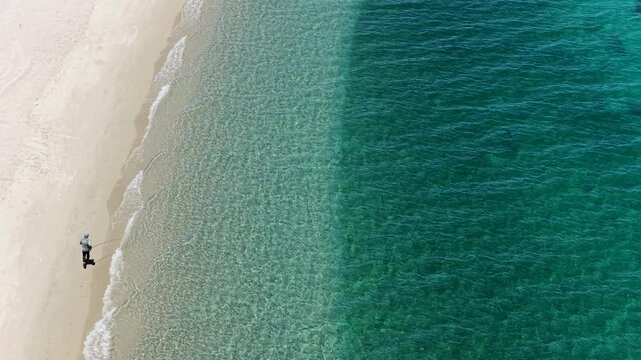 Aerial view of a fly fisherman on the beach at Punta Arena in La Ventana, Mexico.