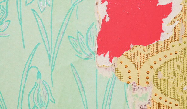 Old torn wallpaper on the wall.Old wallpaper for texture or background.