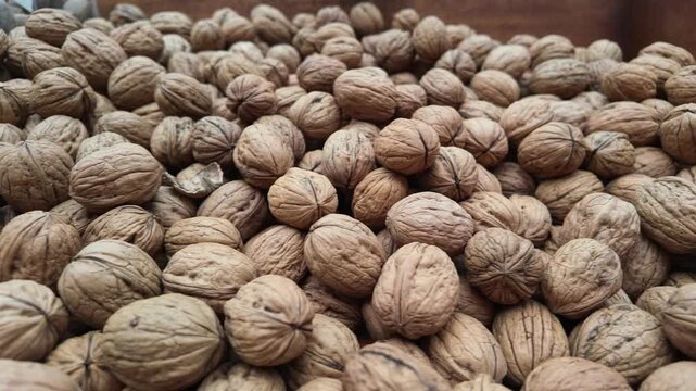 Walnuts in a wooden box at a local market