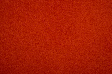 Close up detail of orange leather material surface texture © reddish