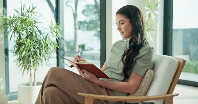Woman, writing and smile with notebook in home, creative and planning for goals with info and ideas. Journaling, notes and happy person with journal, reminder and schedule agenda with diary in house