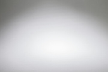 Naklejka premium Abstract white gradient background with center spotlight highlight and soft vignette effect