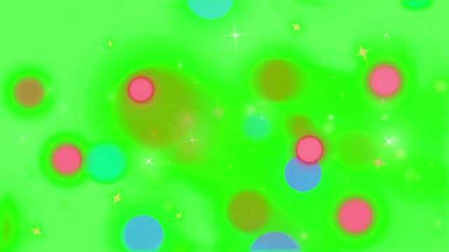 Colorful glowing bokeh circles and tiny star lights drift across a vibrant green chroma key background.