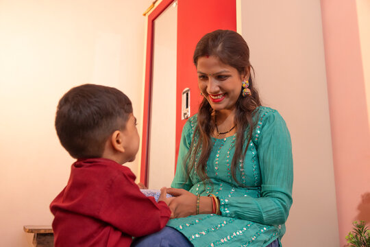 Mother and son sharing a tender moment at home