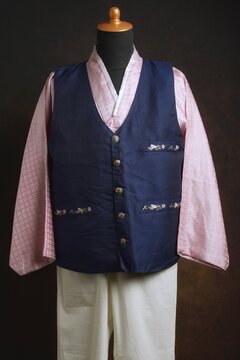 Traditional Korean Male Hanbok with Vest or Jokki Displayed on a Dress Form