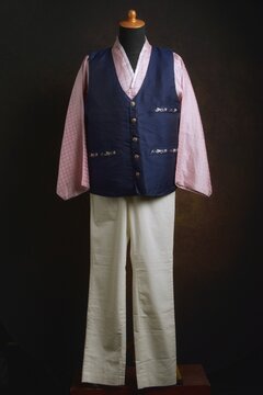 Traditional Korean Male Hanbok with Vest or Jokki Displayed on a Dress Form
