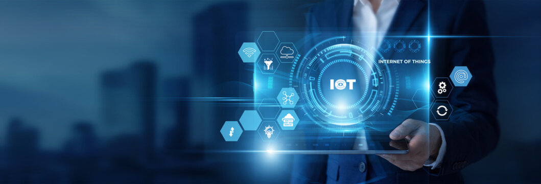 Businessman Hand Holding Digital Tablet to Analyze IoT Data and Internet of Things, Connected Device, Smart Sensor Network, Edge Computing, Embedded Infrastructure
