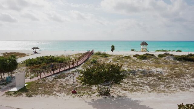 Coastal landscape Jardines del Rey Cuba sandy dunes sparse coastal turquoise ocean overcast sky