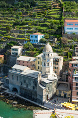 Fototapeta premium Scenic view of Vernazza village with Church of St Margaret of Antioch