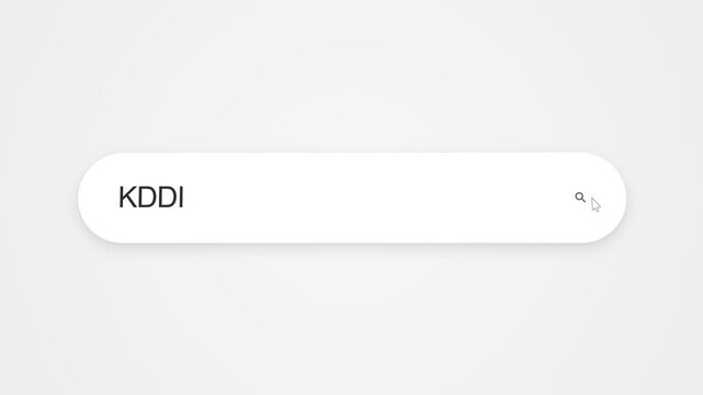 Typing KDDI into a web browser search bar using a computer