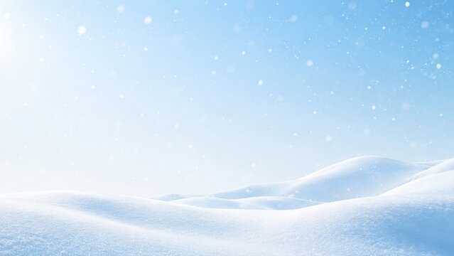 Soft snow-covered rolling hills beneath a bright blue sky with gentle falling snowflakes and sunlit, pristine winter light