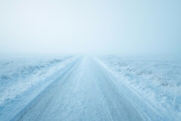 Fototapeta premium Serene winter road landscape.