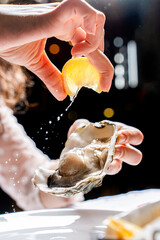 Lemon Juice Splashing on Fresh Oyster © udeyismail