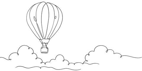 Hot air balloon flying above clouds line drawing © ImageFlow 