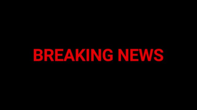 Breaking news headline stands out in vibrant red typography on a stark black backdrop to signify a major current event alert.