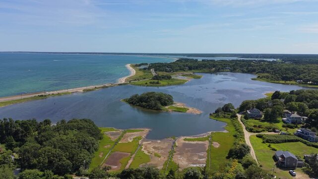 Aerial view of luxury oceanfront homes and coastal road along Vineyard Sound in Oak Bluffs, Massachusetts, USA