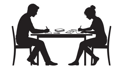 Fototapeta premium Two people seated at a table engaged in writing silhouette