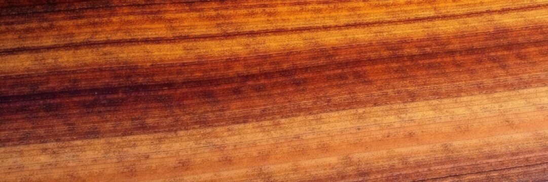 Striated sandstone layers forming horizontal bands in outback Australia, ochre, layers
