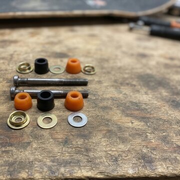 Essential Skateboard Truck Bushing Replacement Hardware Kit Featuring Vibrant Polyurethane Cushions and Durable Steel Bolts for Precision Board Performance Tuning